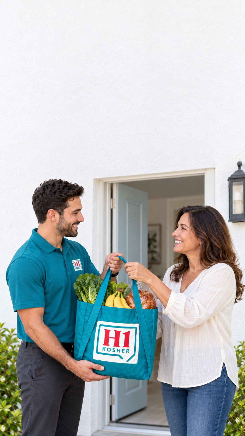 H1 Kosher driver handing a grocery delivery to a customer at the door