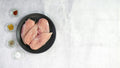 Raw chicken breast cutlets (sample photo)