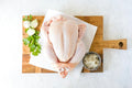 Raw whole chicken (sample photo)