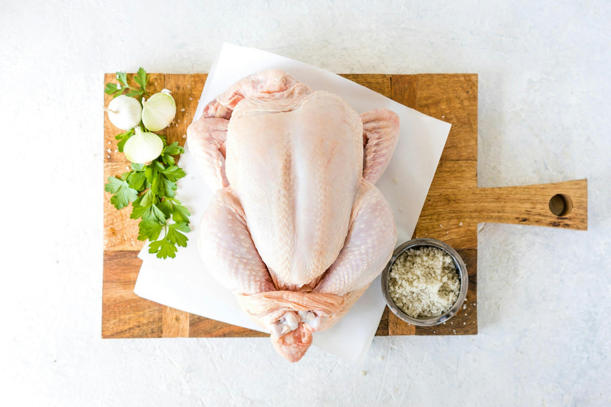 Raw whole chicken (sample photo)